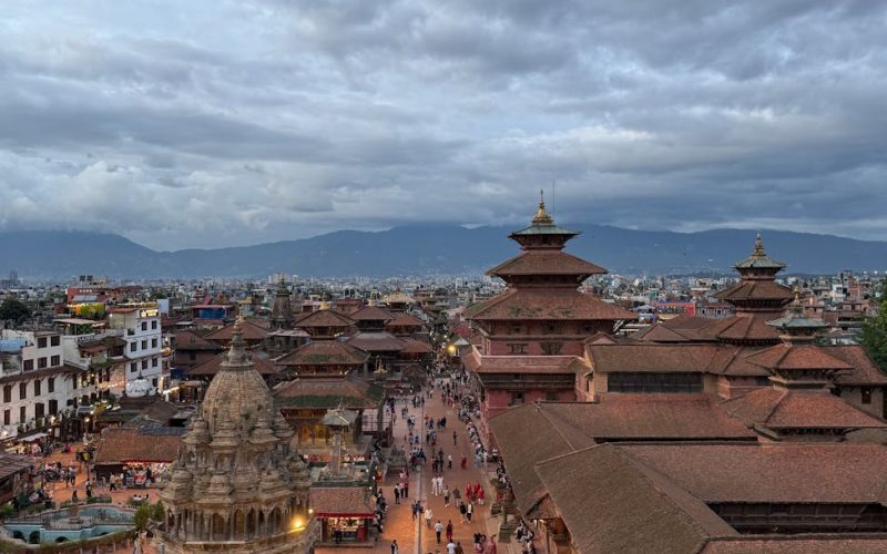 Stunningly detailed aerial view of Patan Durbar Square showcasing historic architecture and bustling activity.