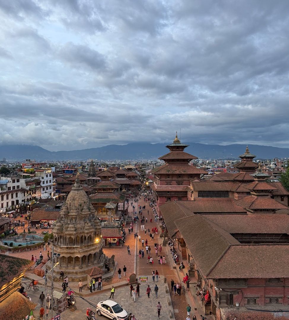 Stunningly detailed aerial view of Patan Durbar Square showcasing historic architecture and bustling activity.